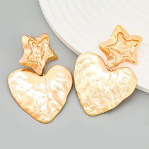 New gold plated star heart earrings, maripose closure.